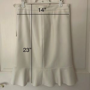 Knee length ivory ruffle bottom skirt